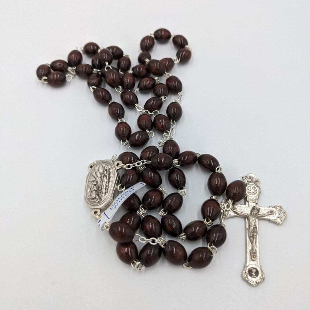 ROSARY BEADS - SMOOTH BROWN BEADS WITH LOURDES WATER